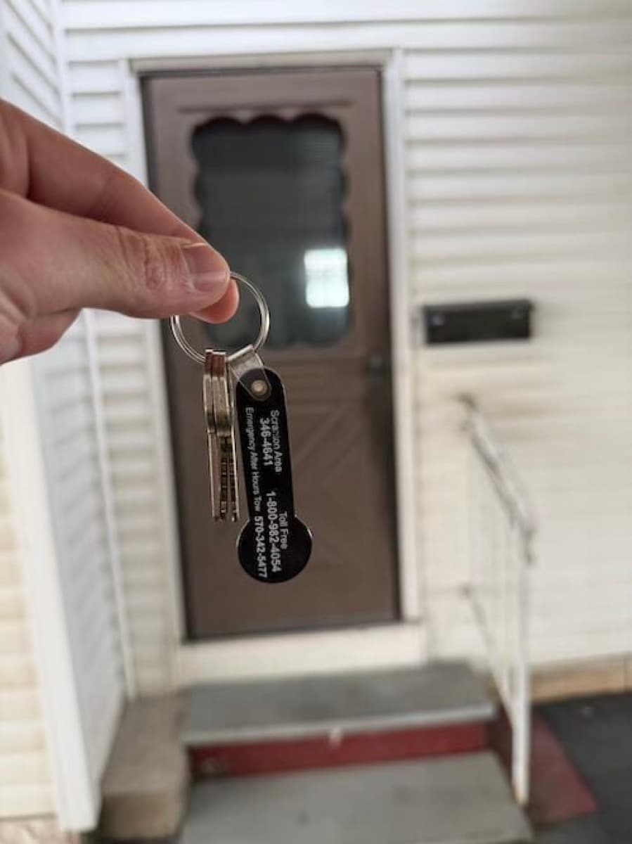 Keys in hand at a recently purchased Pennsylvania home — closing day with House Buying Solutions