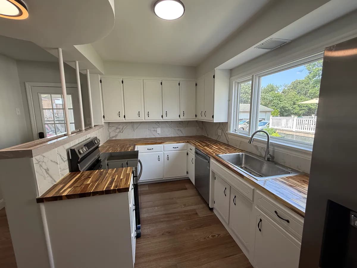 Renovated kitchen at 4036 Birney Avenue in Moosic with updated counters, flooring, and finishes