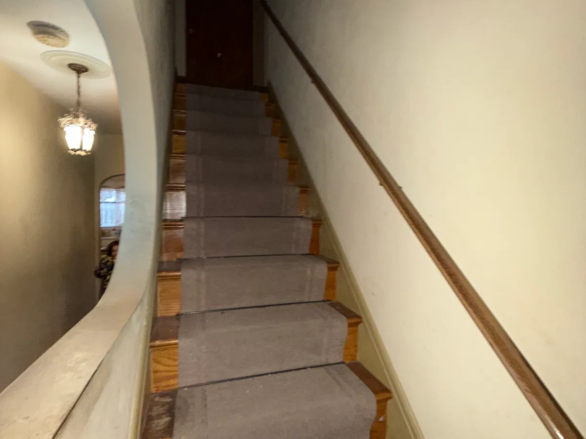 Interior stairway at 4036 Birney Avenue in Moosic before renovation