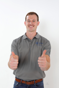 House buying solutions managing member Jake Arnold Giving Thumbs Up